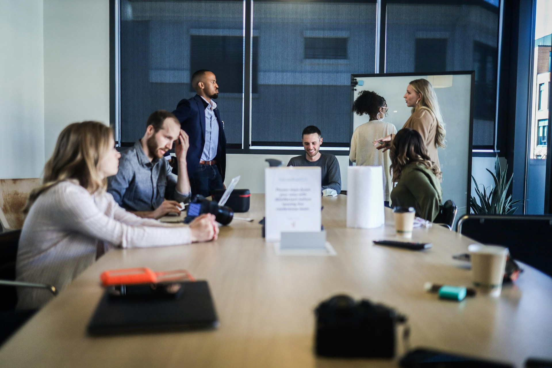 Team meeting in which several members join the discussion openly
